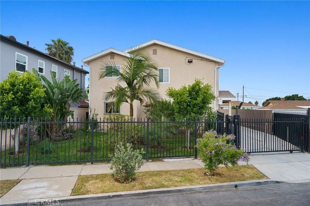 Photo of 329 E Lanzit Ave, Los Angeles, CA 90061 (MLS # DW26039266)