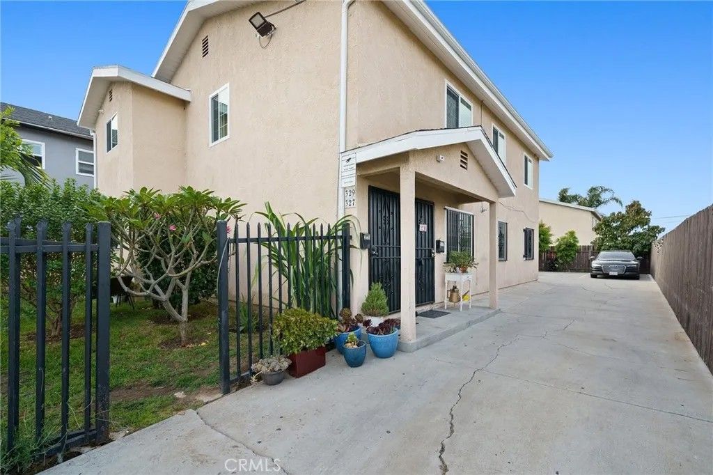 Photo of 329 E Lanzit Ave, Los Angeles, CA 90061 (MLS # DW26039266)
