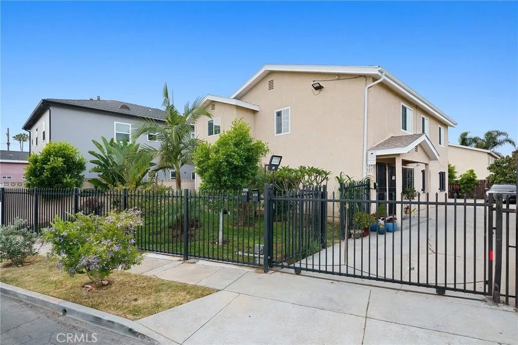 Photo of 329 E Lanzit Ave, Los Angeles, CA 90061 (MLS # DW26039266)