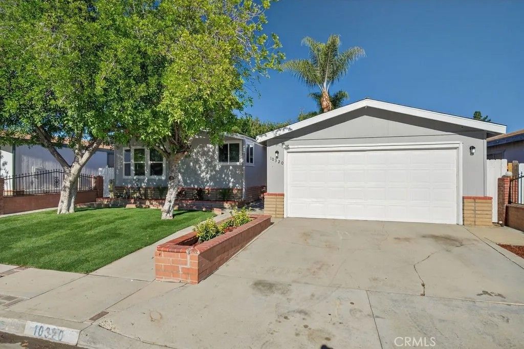Photo of 10320 Wrangler Way, Corona, CA 92883 (MLS # CV25273662)