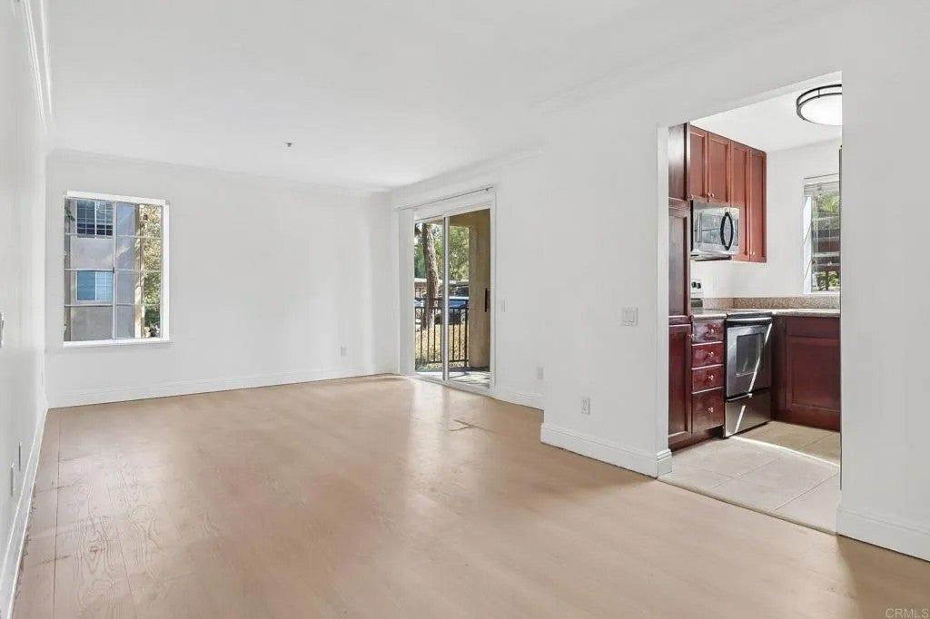 Photo of 5648 Amaya Drive #118, La Mesa, CA 91942 (MLS # PTP2606426)