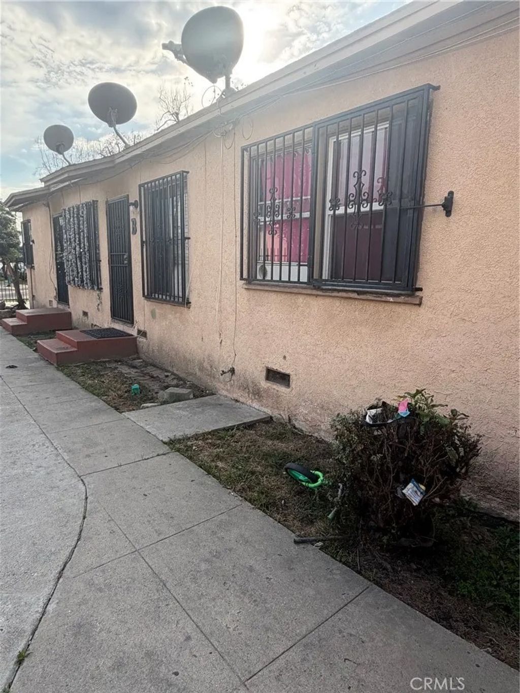 Photo of 1631 E Saunders St, Compton, CA 90221 (MLS # PW25281996)