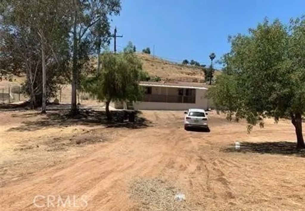 Photo of 21180 Mazie Avenue, Perris, CA 92570 (MLS # CV26048565)