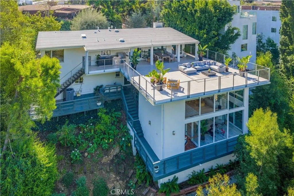 Photo of 4011 Farmouth Dr, Los Angeles, CA 90027 (MLS # OC26051482)