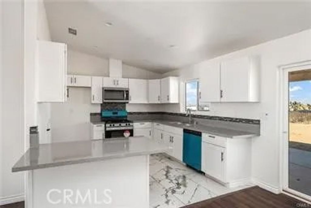 Photo of 12275 Barbet Rd, Phelan, CA 92371 (MLS # IG26005588)