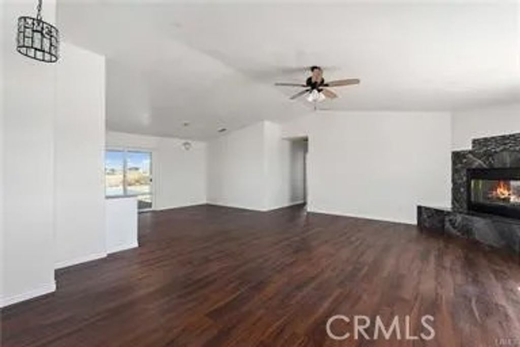 Photo of 12275 Barbet Rd, Phelan, CA 92371 (MLS # IG26005588)