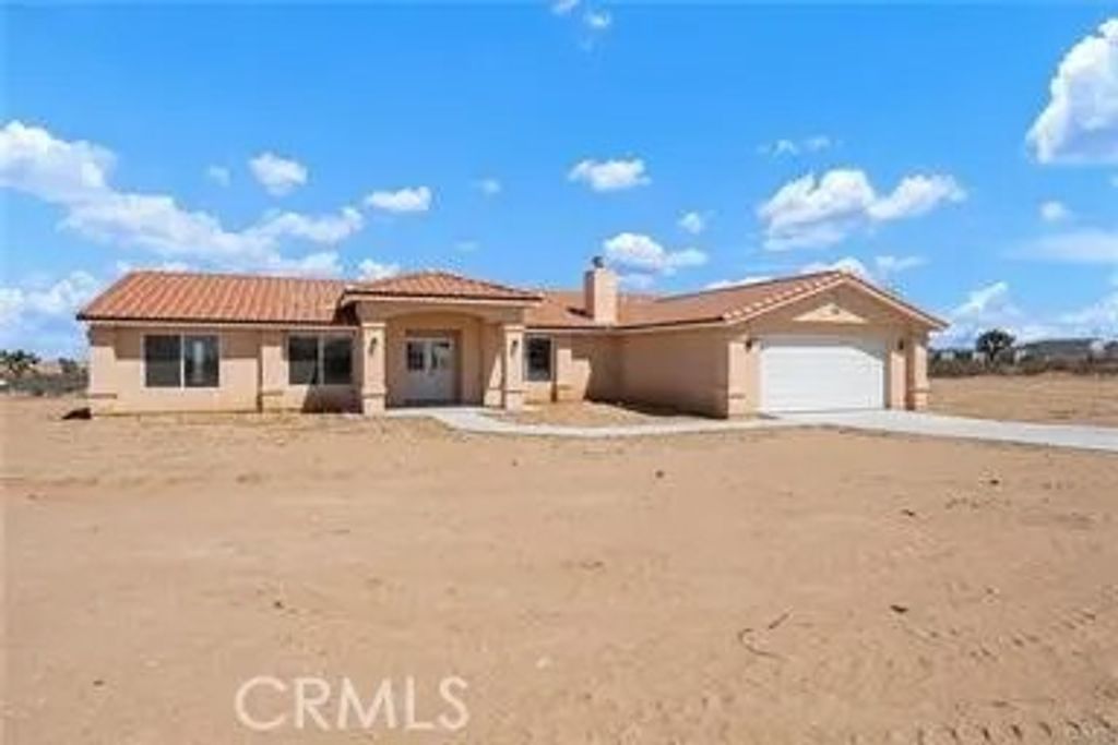 Photo of 12275 Barbet Rd, Phelan, CA 92371 (MLS # IG26005588)