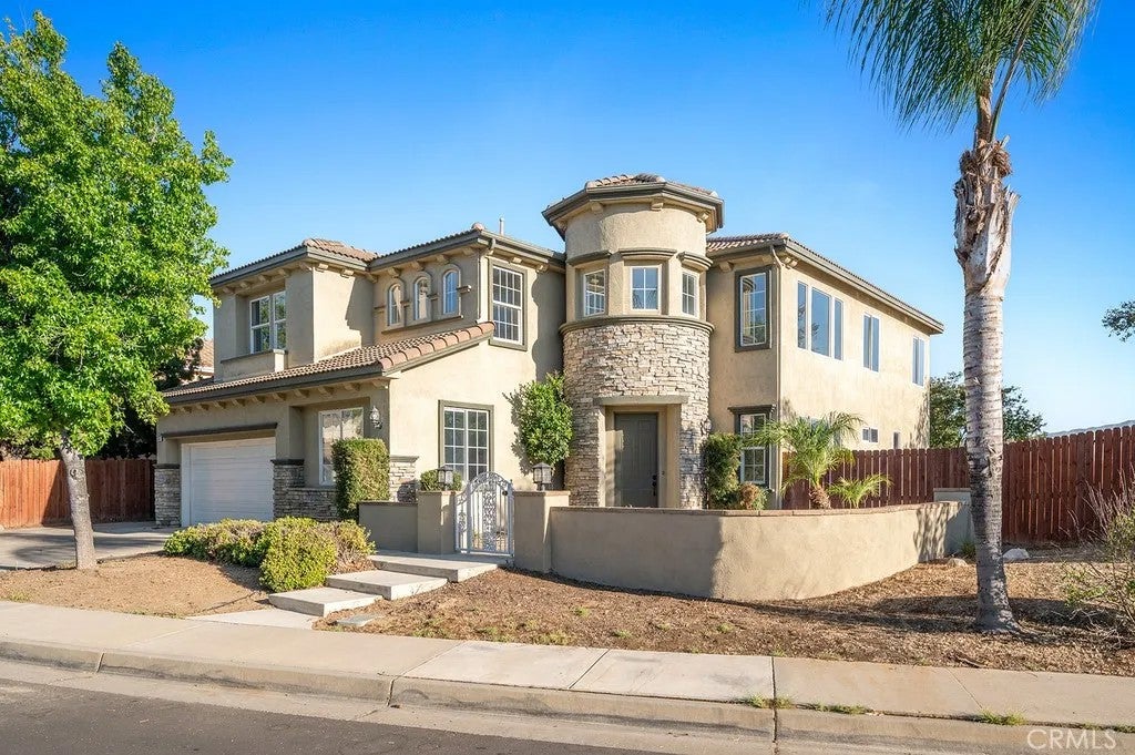 Photo of 31501 Stoney Creek Drive, Lake Elsinore, CA 92532 (MLS # OC26118737)