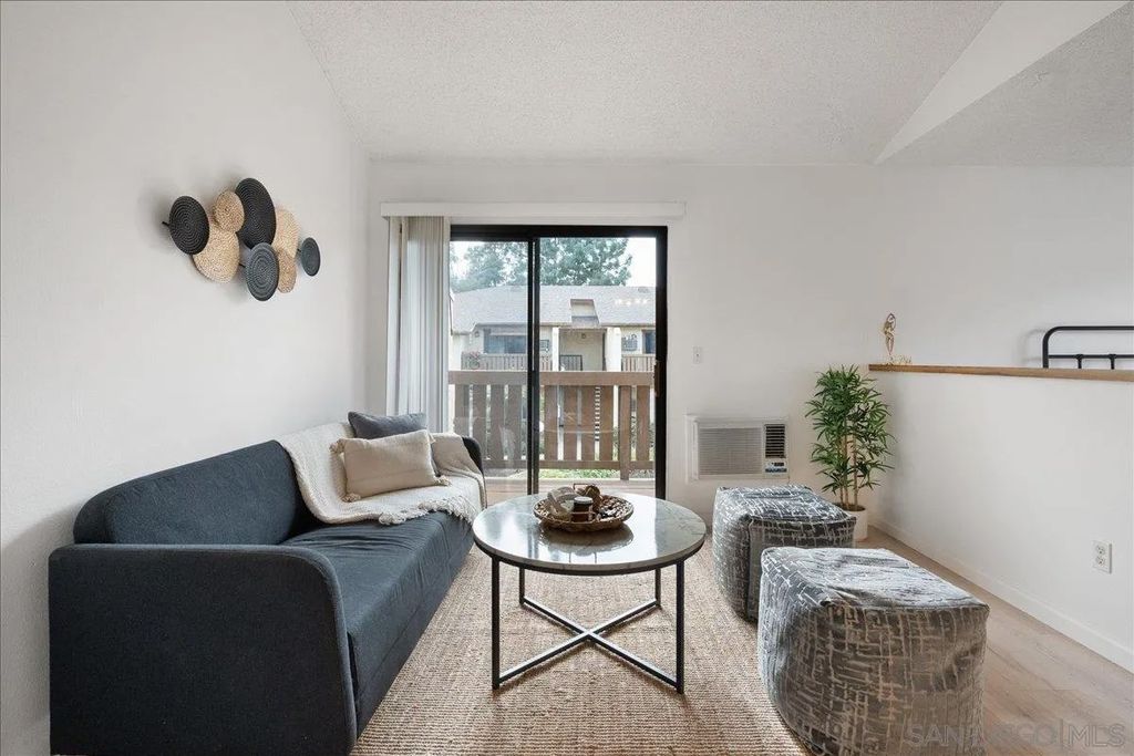 Photo of 10296 Black Mountain Rd #220, San Diego, CA 92126 (MLS # 260001874)