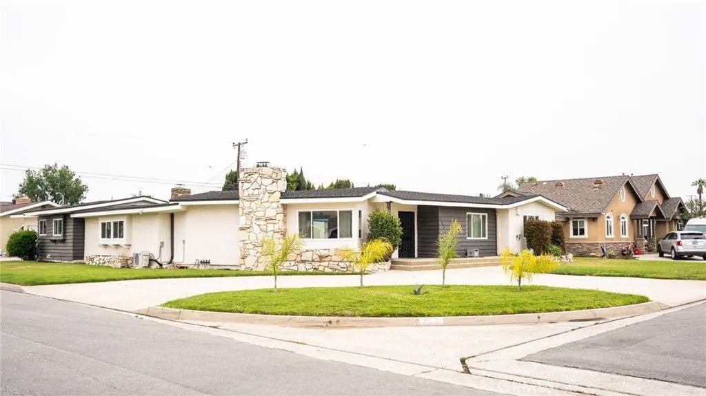 Photo of 9837 Belfair Street, Bellflower, CA 90706 (MLS # DW26071301)