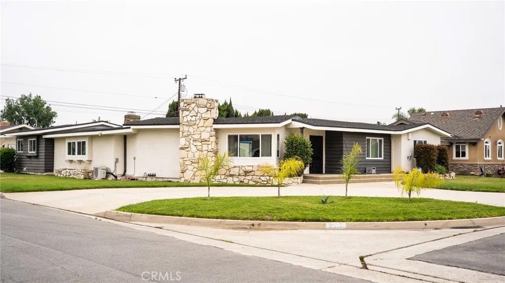 Photo of 9837 Belfair Street, Bellflower, CA 90706 (MLS # DW26071301)