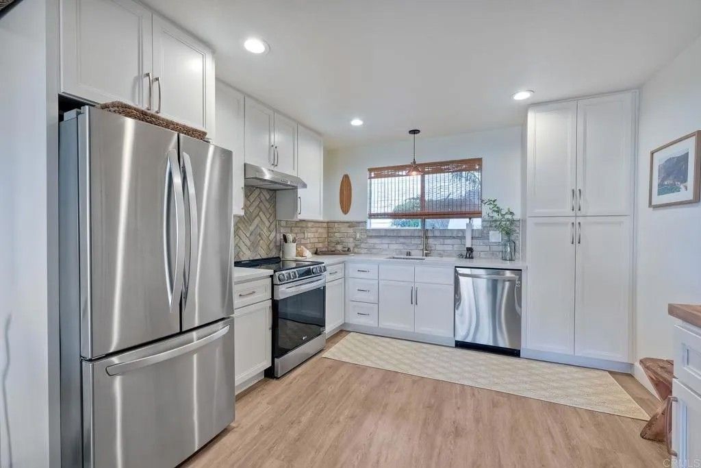 Photo of 908 Caminito Madrigal #F, Carlsbad, CA 92011 (MLS # NDP2601644)