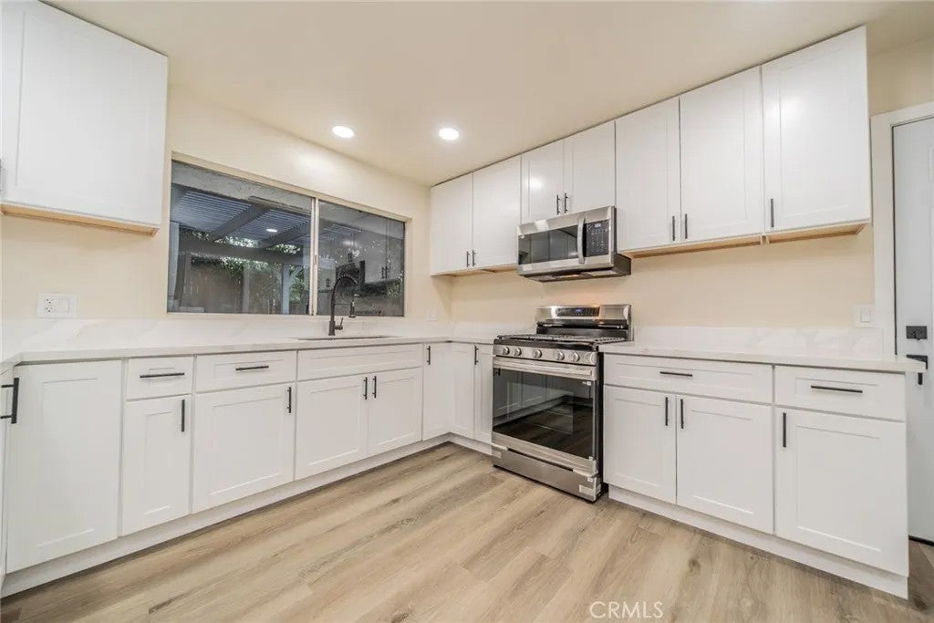 Photo of 11410 Lombardy LN, Moreno Valley, CA 92557 (MLS # CV26166319)