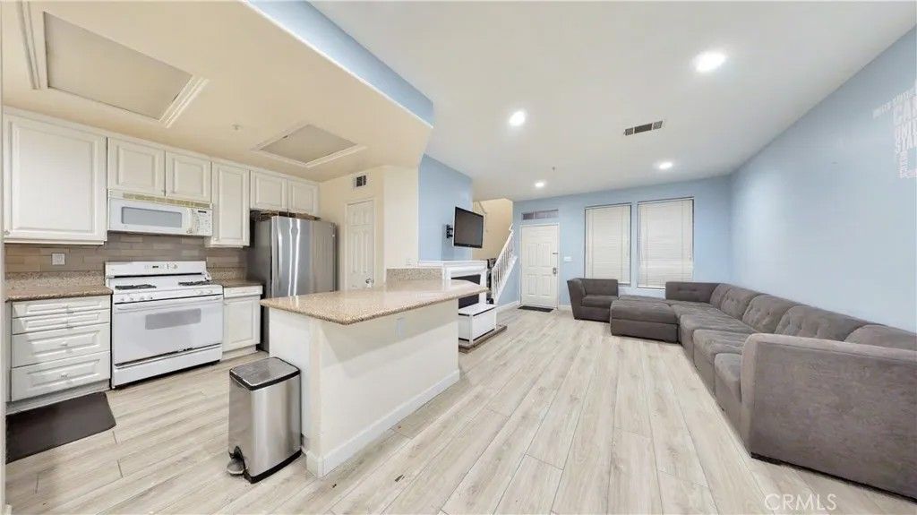 Photo of 332 W Summerfield Cir, Anaheim, CA 92802 (MLS # PW26074769)