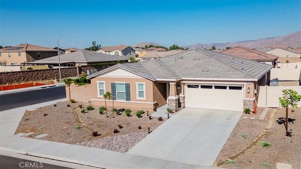 Photo of 996 Woodstone Drive, San Jacinto, CA 92582 (MLS # CV26138382)