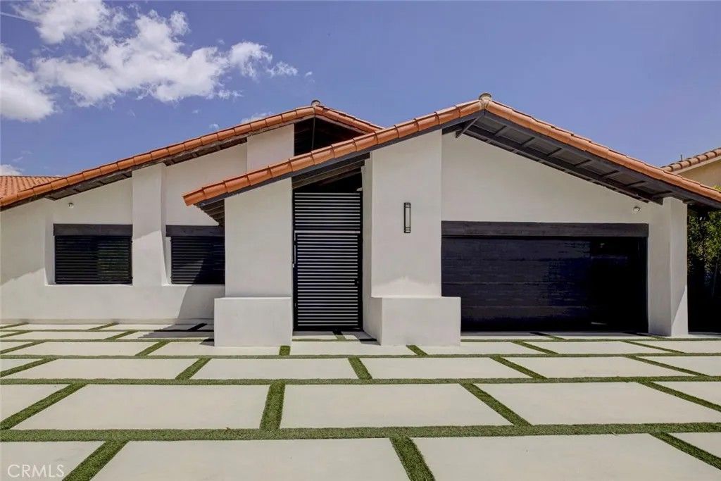 Photo of 9450 Tampa Ave, Northridge, CA 91324 (MLS # GD26080280)
