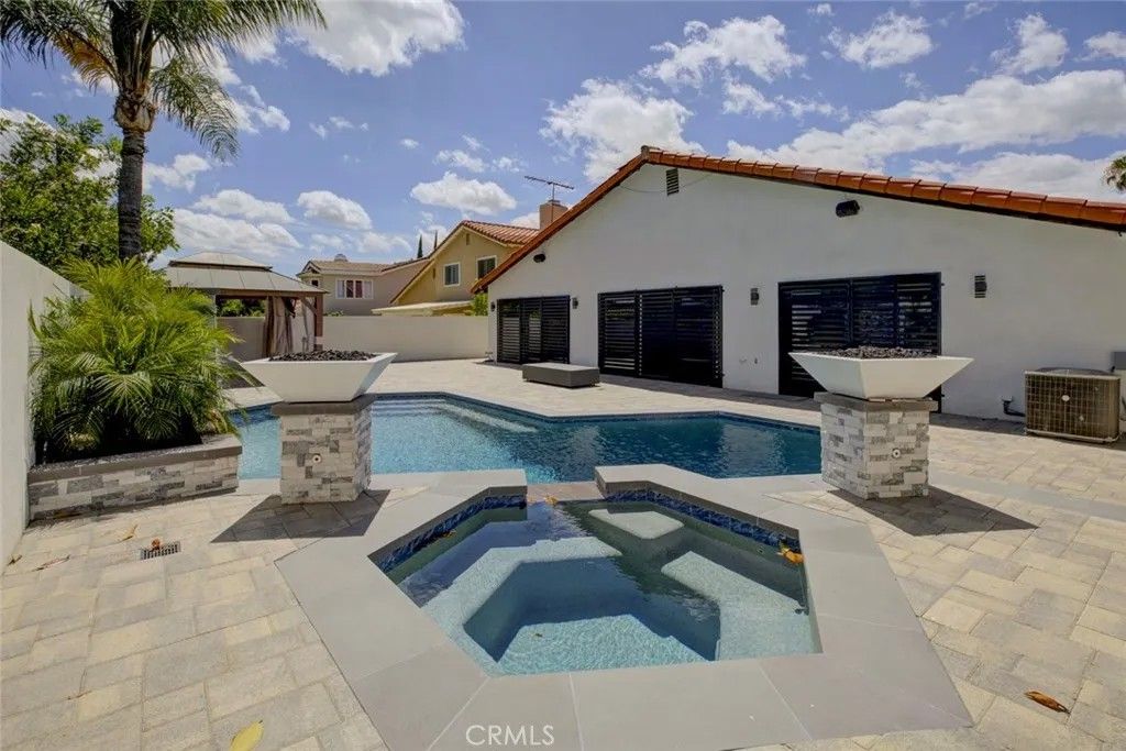 Photo of 9450 Tampa Ave, Northridge, CA 91324 (MLS # GD26080280)