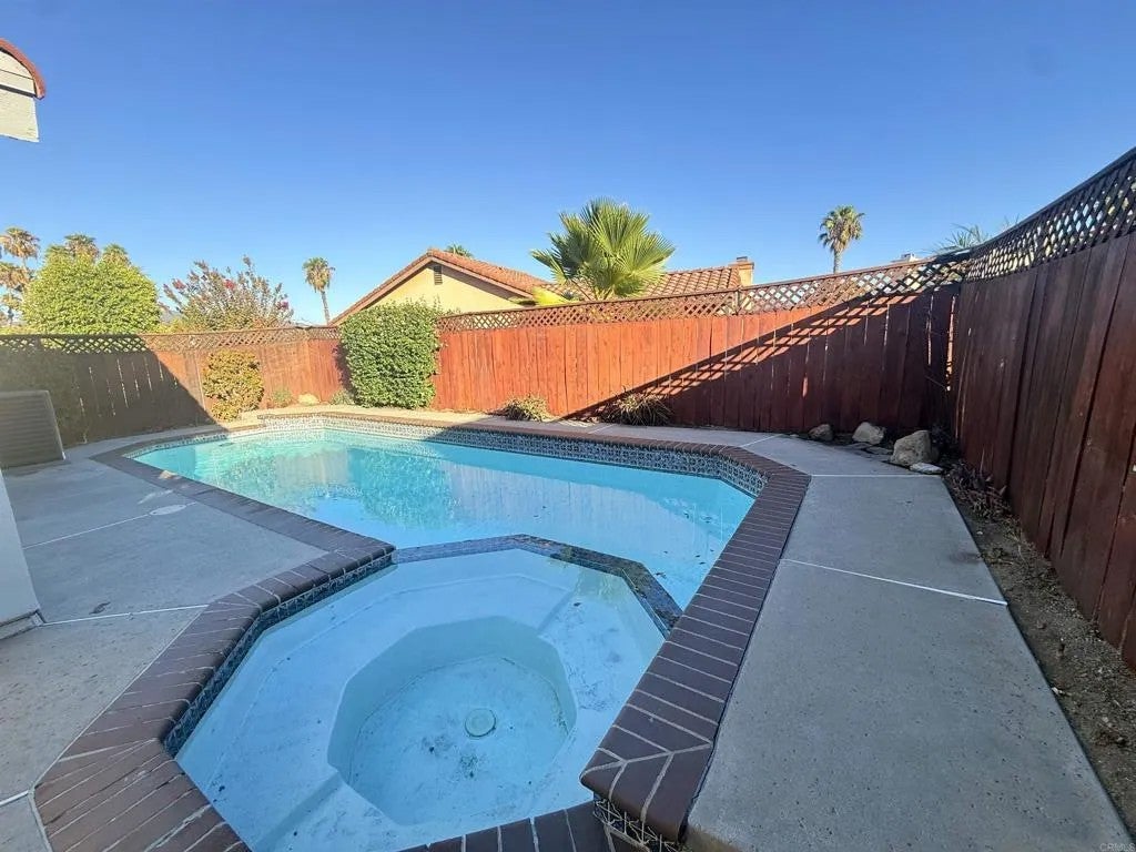 Photo of 12027 Via Hacienda, El Cajon, CA 92019 (MLS # PTP2606316)
