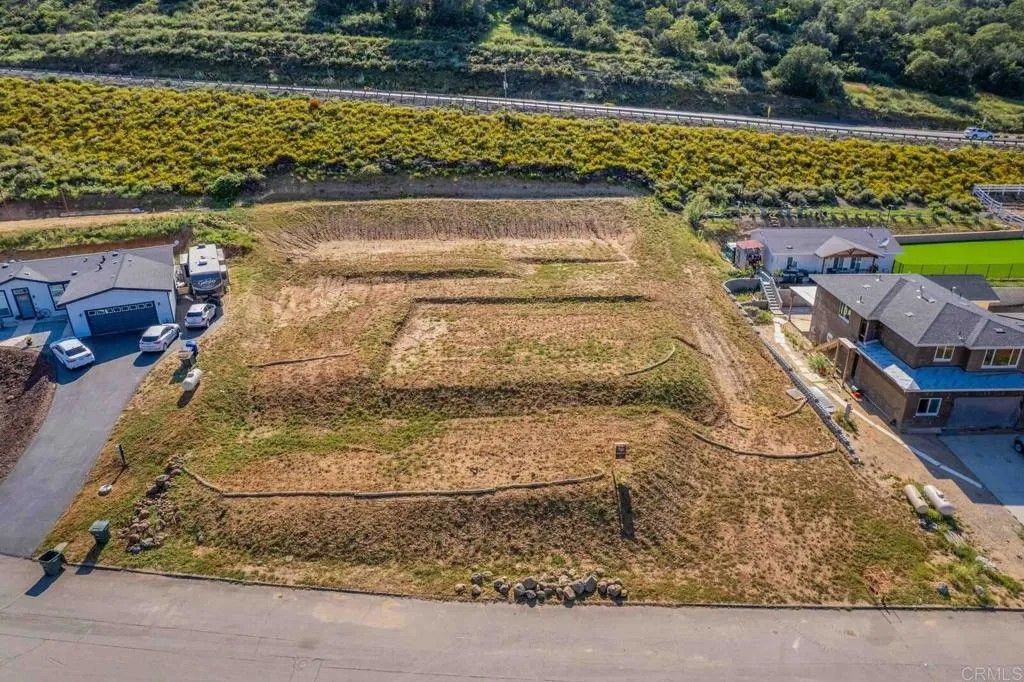 Photo of 13814 Woods Valley, Valley Center, CA 92082 (MLS # PTP2602184)