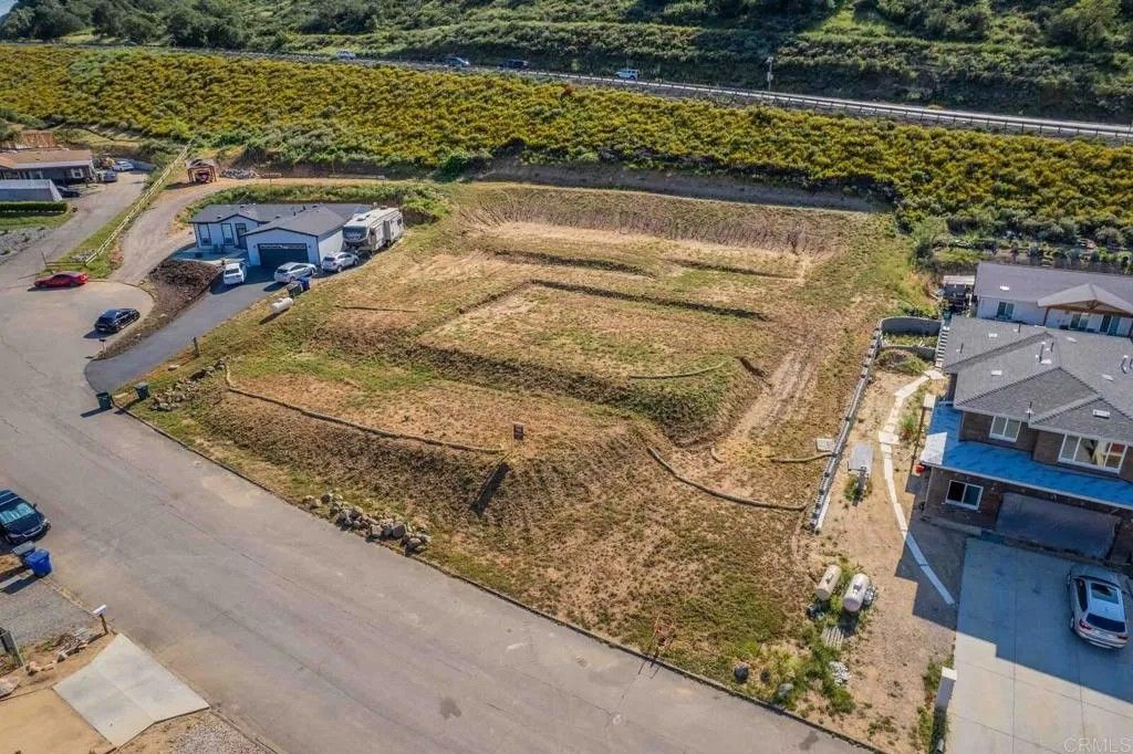 Photo of 13814 Woods Valley, Valley Center, CA 92082 (MLS # PTP2602184)