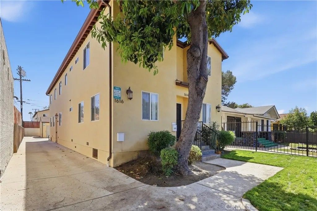 Photo of 1614 W 39th Place, Los Angeles, CA 90062 (MLS # OC26089547)