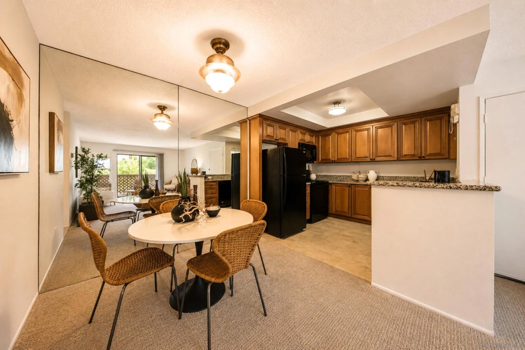 Photo of 6012 Rancho Mission #302, San Diego, CA 92108 (MLS # 260018576)