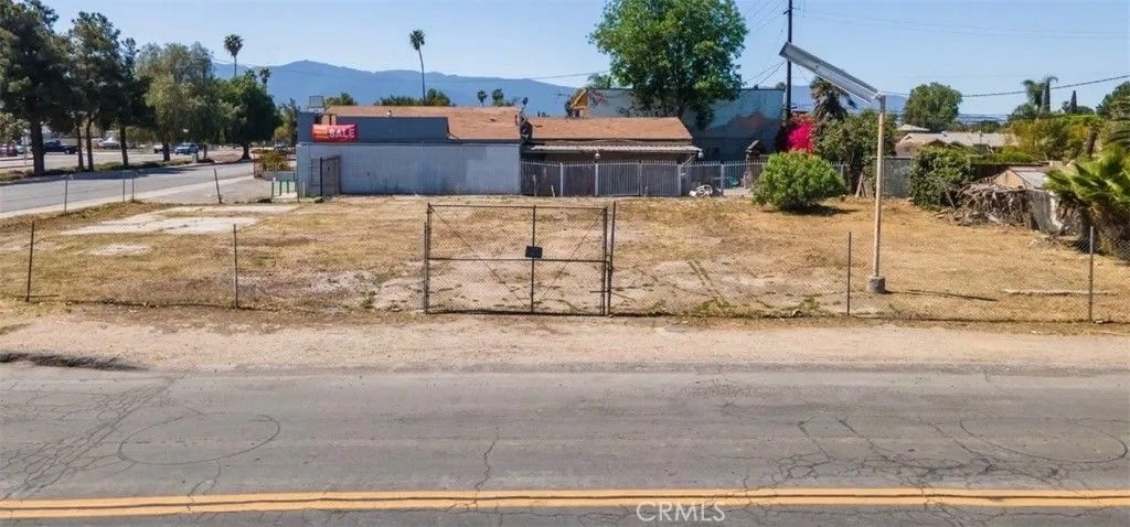 Photo of 13653 Magnolia Ave, Corona, CA 92879 (MLS # IV26037610)