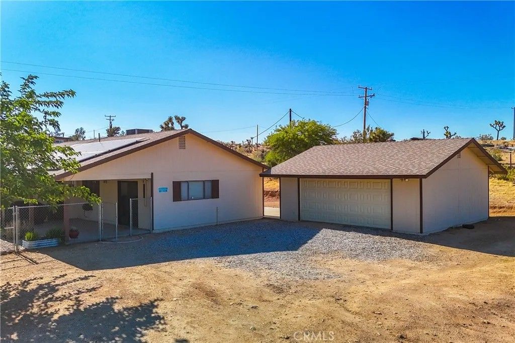 Photo of 57920 Buena Vista Drive, Yucca Valley, CA 92284 (MLS # JT26041023)