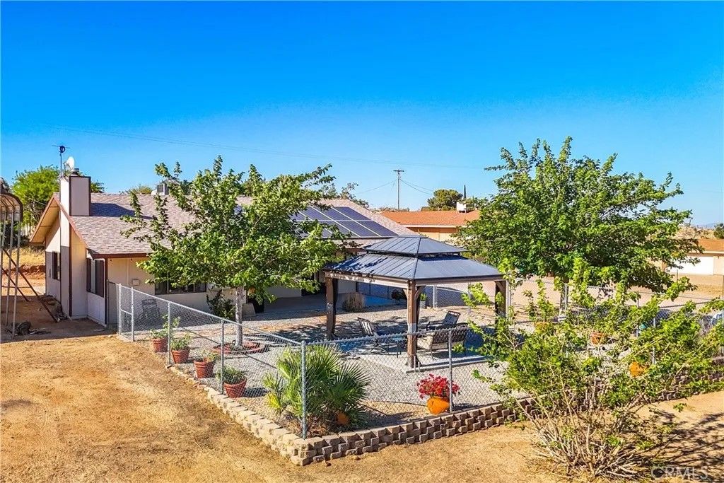 Photo of 57920 Buena Vista Drive, Yucca Valley, CA 92284 (MLS # JT26041023)