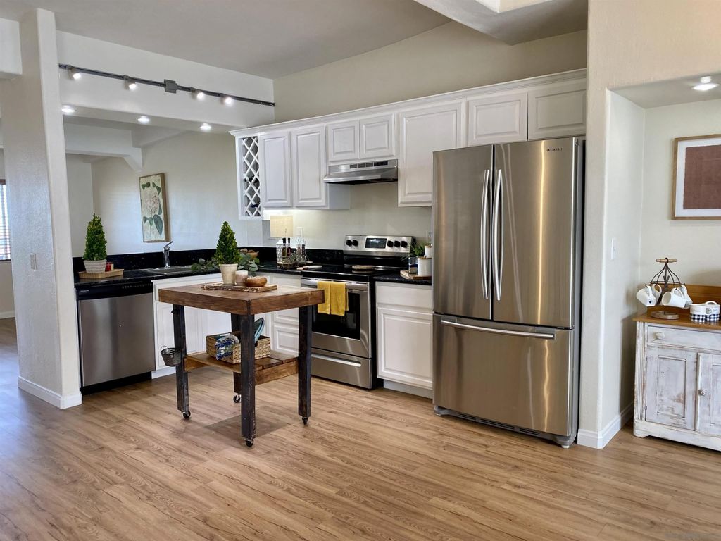 Photo of 2333 Caringa Way #31, Carlsbad, CA 92009 (MLS # 250045125)