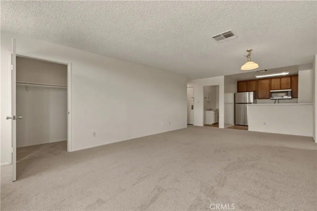 Photo of 17312 Chatsworth Street #L, Granada Hills, CA 91344 (MLS # SR26079855)