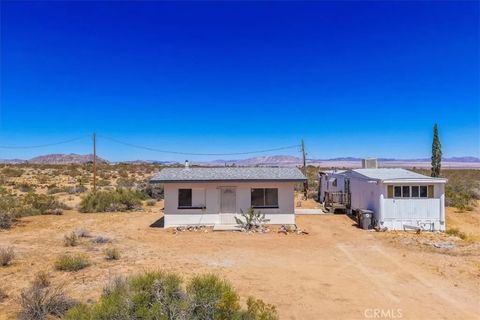 Photo of 60650 Winters Rd, Landers, CA 92285 (MLS # JT26083249)