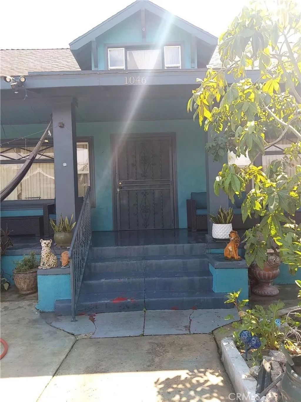 Photo of 1046 W 49th St, Los Angeles, CA 90037 (MLS # CV26071048)