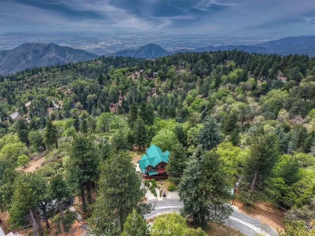 Photo of 2489 Spring Oak, Running Springs, CA 92382 (MLS # IG26083837)