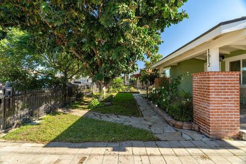Tiny photo for 1612 W 58th St, Los Angeles, CA 90062 (MLS # SB25267453)