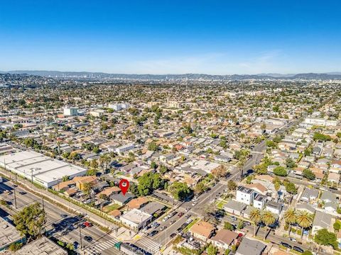 Tiny photo for 1612 W 58th St, Los Angeles, CA 90062 (MLS # SB25267453)