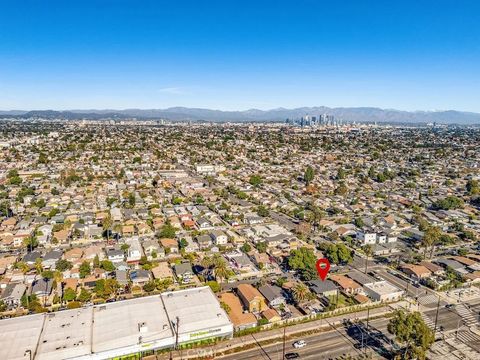 Tiny photo for 1612 W 58th St, Los Angeles, CA 90062 (MLS # SB25267453)
