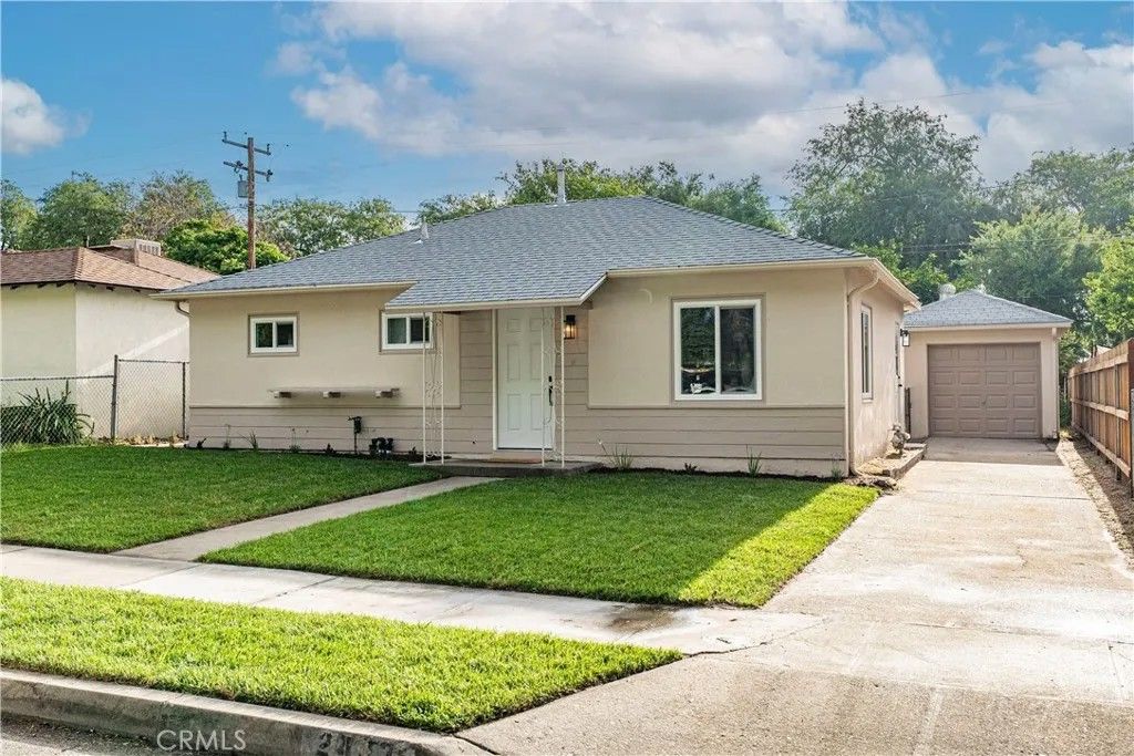 Photo of 2443 Roxbury Drive, San Bernardino, CA 92404 (MLS # IV26070485)