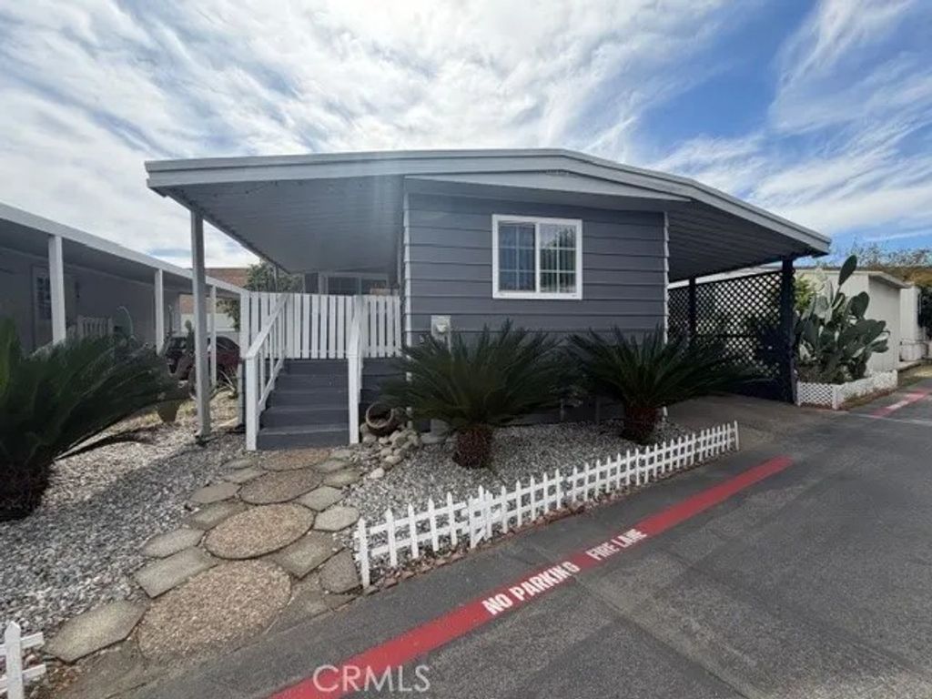 Photo of 1512 E 5th St #85, Ontario, CA 91764 (MLS # CV26050271)