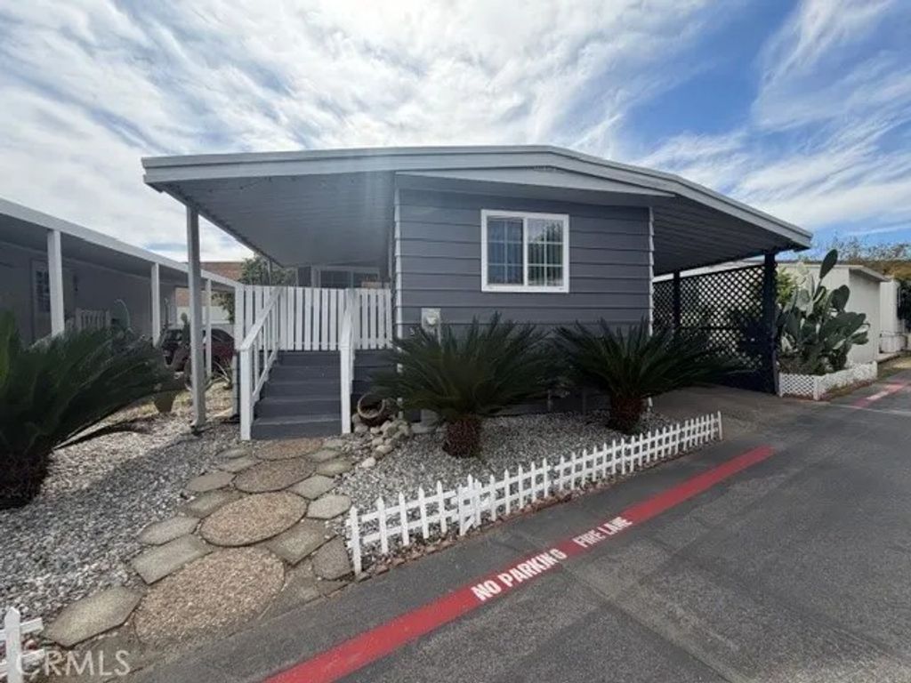 Photo of 1512 E 5th St #85, Ontario, CA 91764 (MLS # CV26050271)