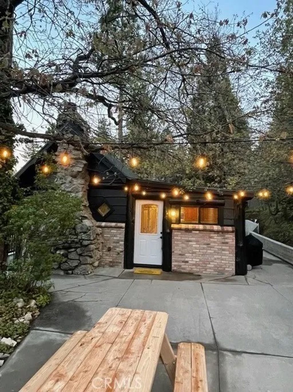 Photo of 2410 Secret Dr, Running Springs, CA 92382 (MLS # IG26046338)