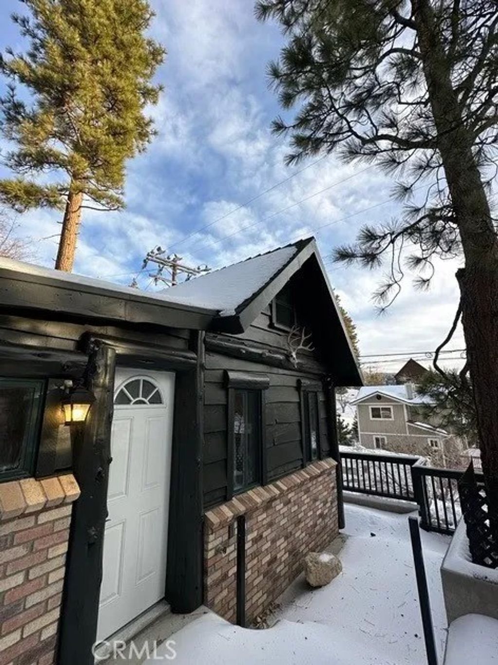 Photo of 2410 Secret Dr, Running Springs, CA 92382 (MLS # IG26046338)