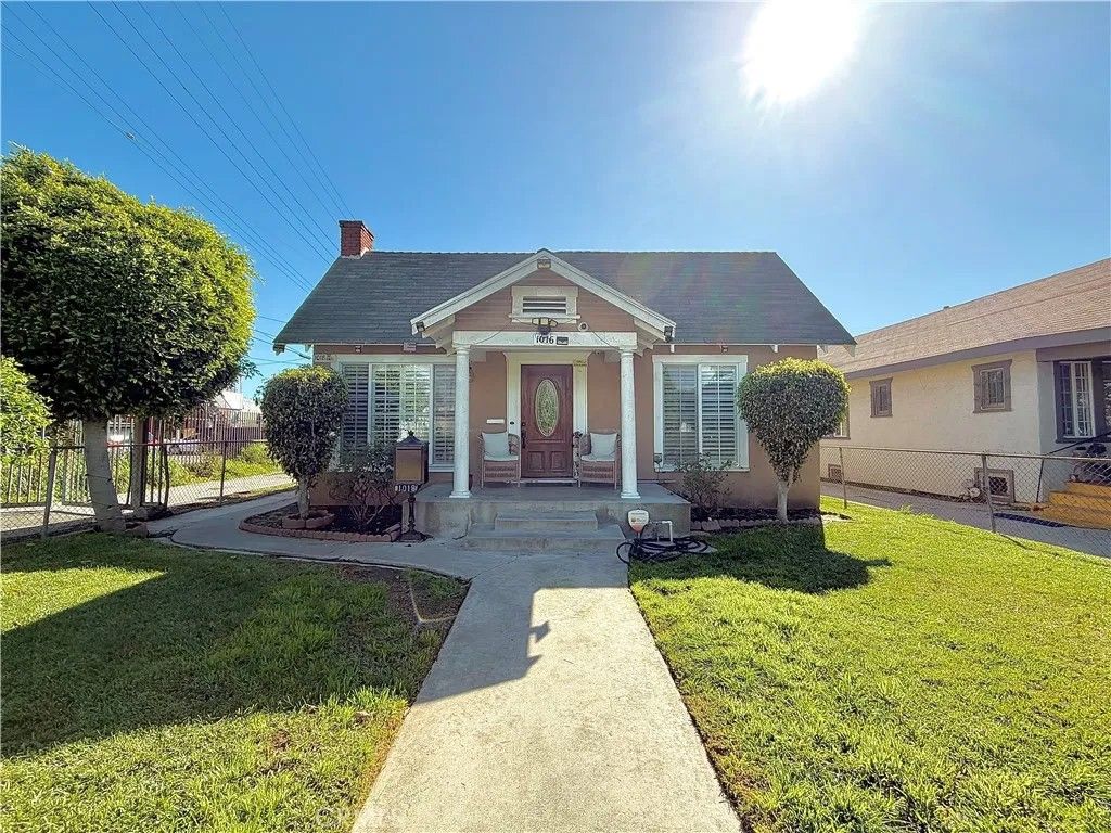 Photo of 1016 W 51st Place, Los Angeles, CA 90037 (MLS # DW26037253)