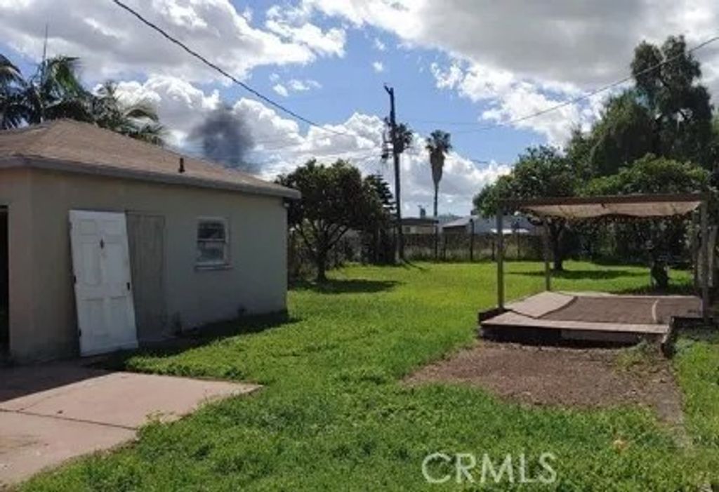 Photo of 852 W 112th ST, Los Angeles, CA 90044 (MLS # PW26098522)