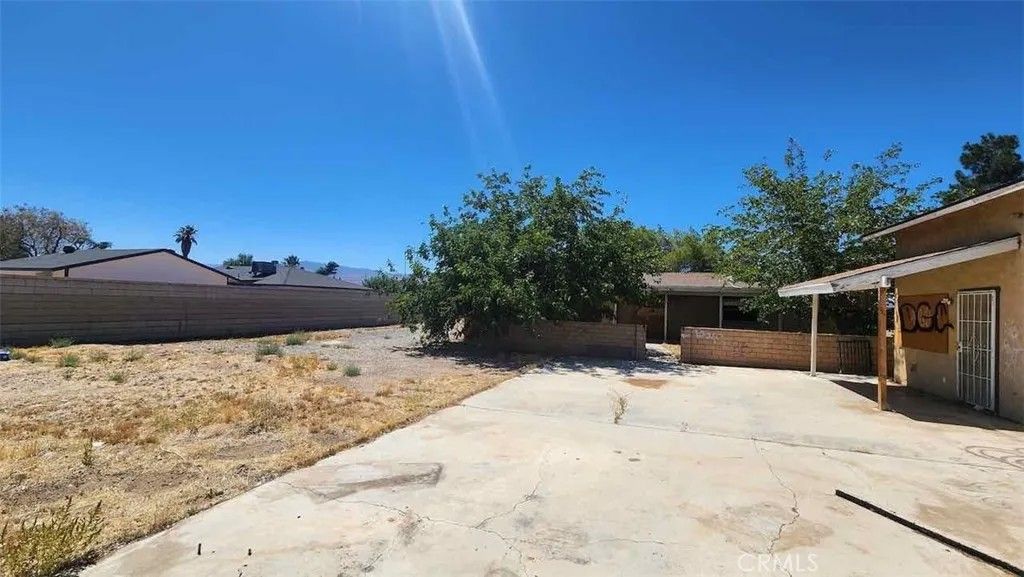 Photo of 22330 Miramot Road, Apple Valley, CA 92308 (MLS # IV26026077)