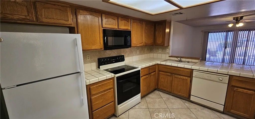 Photo of 19268 Elm Dr, Apple Valley, CA 92308 (MLS # HD26071384)