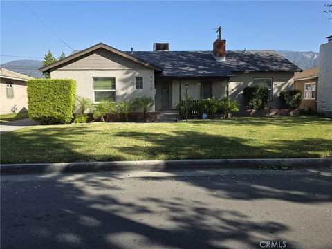 Photo of 520 Country Club Lane, San Bernardino, CA 92404 (MLS # IG26052890)