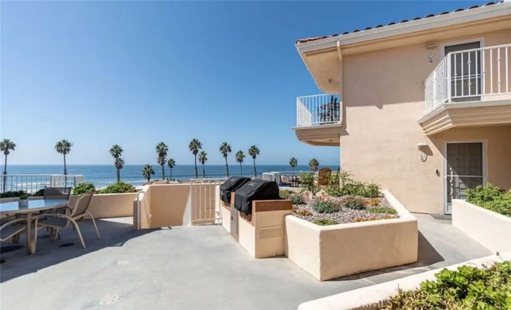 Photo of 621 Pacific Street #107, Oceanside, CA 92054 (MLS # WS25247005)