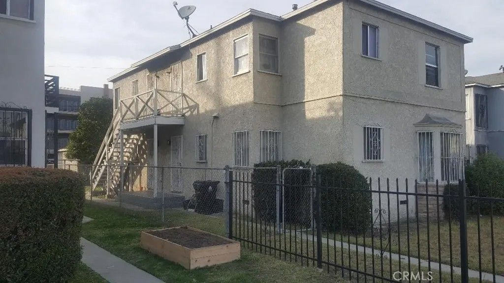 Photo of 6143 S Hobart Boulevard, Los Angeles, CA 90047 (MLS # DW26015600)