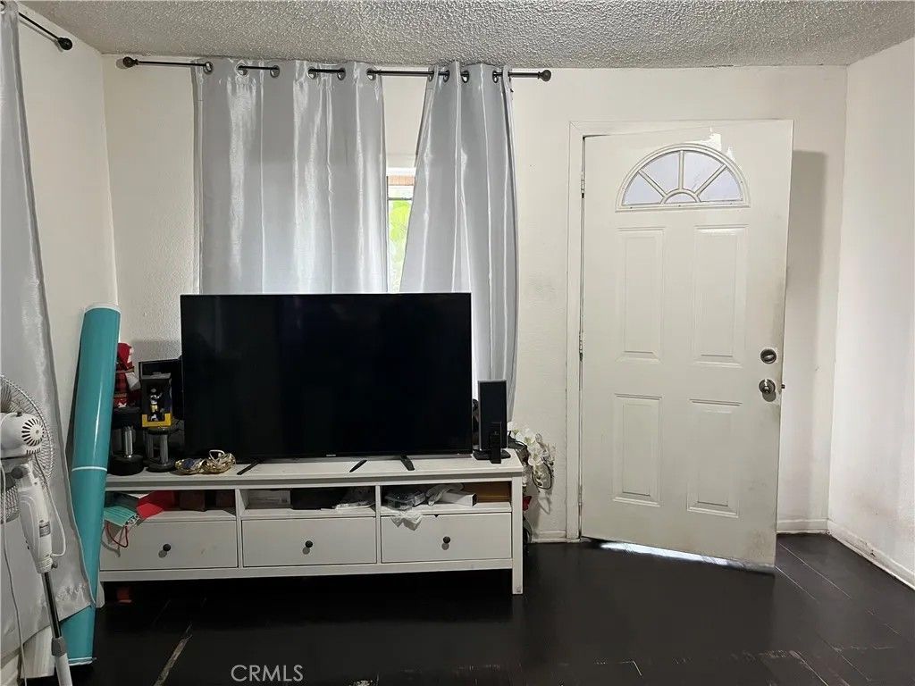 Photo of 9814 Bandera, Los Angeles, CA 90002 (MLS # DW26015354)